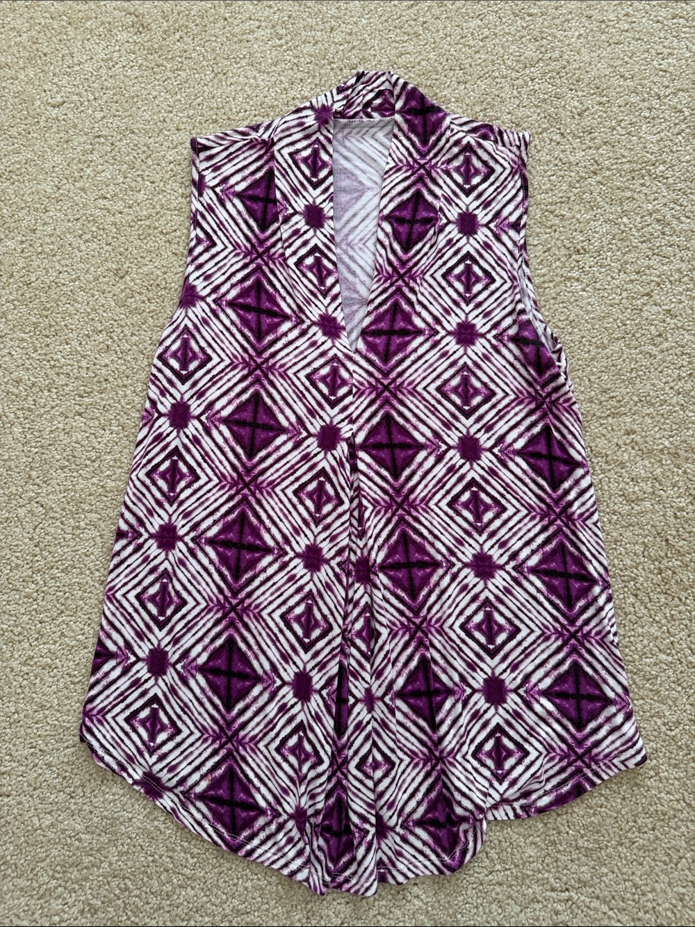 Cable & Gauge Soft sleeveless jersey top with bold geometric print. V-neckline